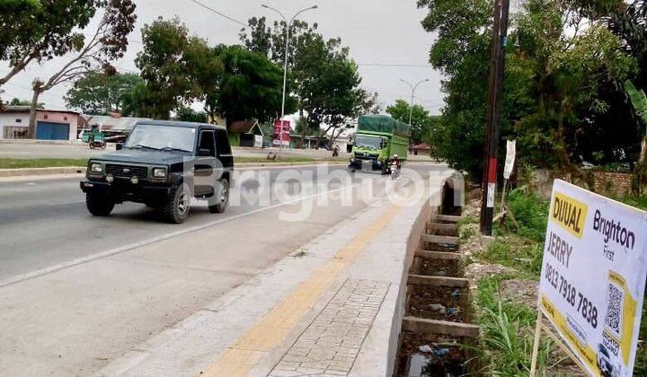 TANAH LUAS DI PINGGIR JALAN LOKASI STRATEGIS DI KARYA JAYA 2