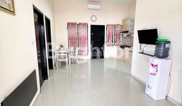 RUMAH FULL FURNISHED CANTIK DAN NYAMAN SIAP PAKAI DI DALAM KOMPLEK CLUSTER 1