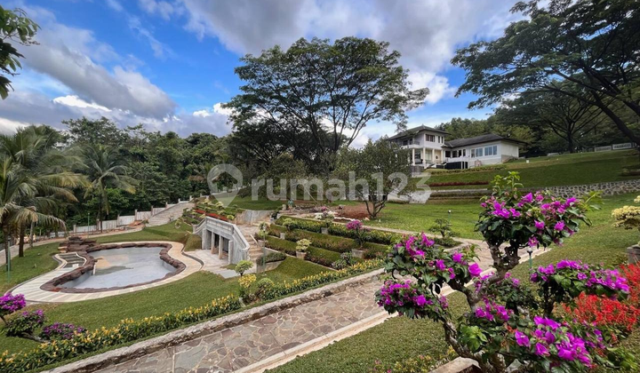 Luxury Home with Private Home Theater, Private Swimming Pool, Fish Pond, and Very Spacious Garden in Sentul City, Bogor.