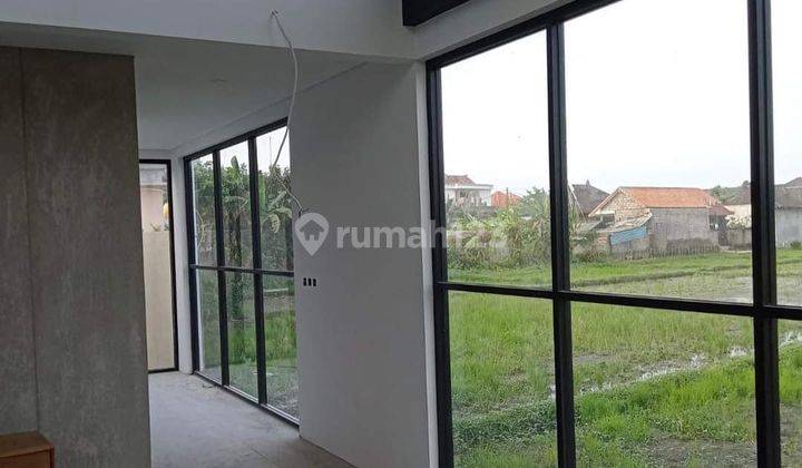 Modern minimalist house with view of Subak rice fields Paguyangan Kangin Denpasar Bali Indonesia  1