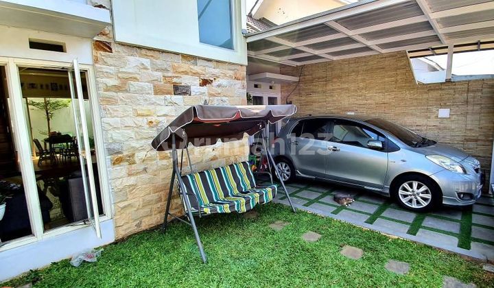 Rumah Artistik 1,5 Lantai di Valencia Residence Puri Suryajaya 2