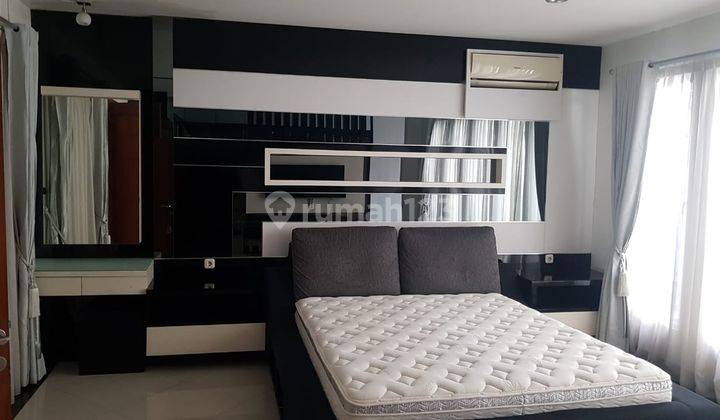 Dijual Rumah Modern Minimalis 2 Lantai di Green Ville Semi Furnished, Luas 214m2 1