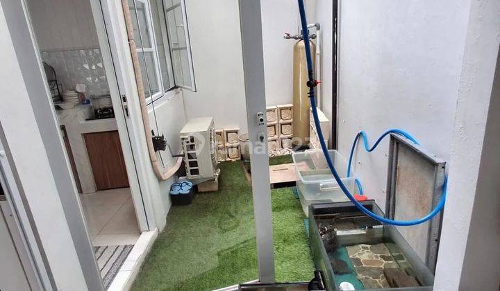 backyard andara village rumah siap huni