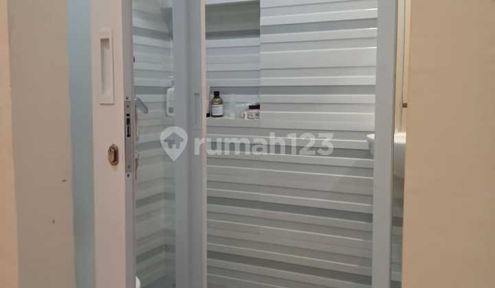 DIJUAL RUMAH 2 LANTAI UKURAN 4X15 DI GREEN LAKE CITY,PETIR,TANGERANG