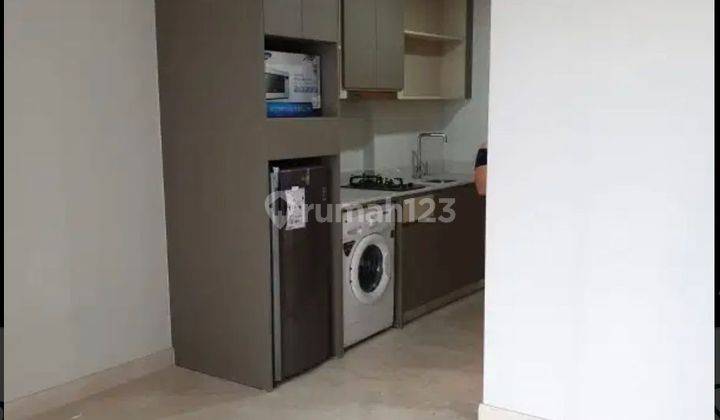 Apartemen Gold Coast Semi Furnished Studio 1