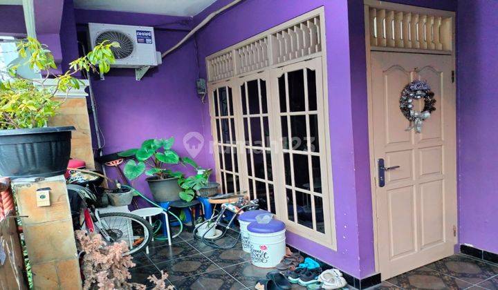 Rumah Minimalis Ungu Nan Bersih  2