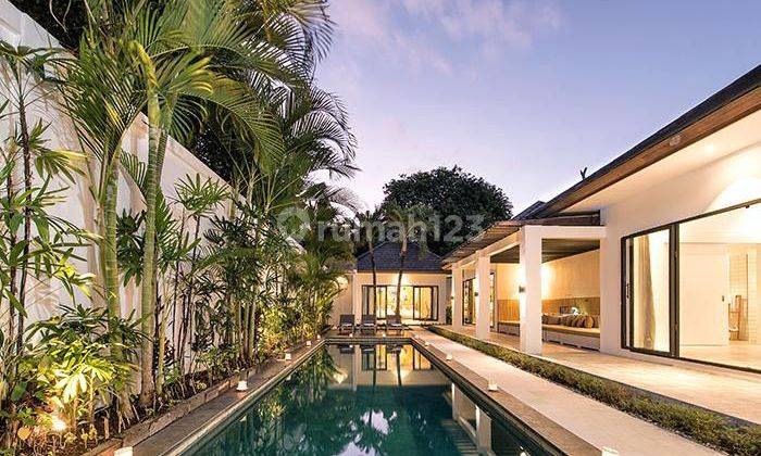 This three-bedroom villa for sale in Seminyak boasts a modern and charming single-floor design, fully furnished for immediate occupancy. Located close to Seminyak Beach, it features a completed pool, offering a delightful and convenient living space in th 1