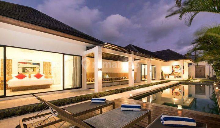 This three-bedroom villa for sale in Seminyak boasts a modern and charming single-floor design, fully furnished for immediate occupancy. Located close to Seminyak Beach, it features a completed pool, offering a delightful and convenient living space in th 2