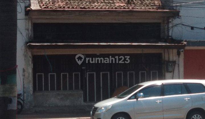 Jual rumah lama di Jl. Sudirman Mainroad  1