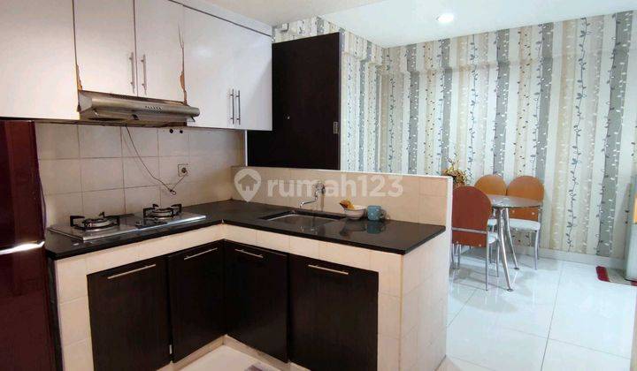 Apartemen Nyaman di Cosmopolis Surabaya Siap Huni RIC.A238 1