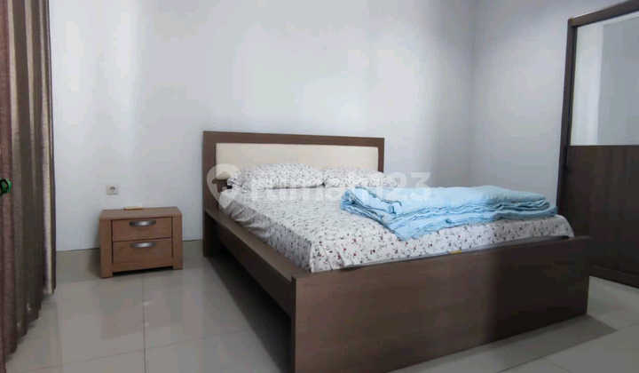 Price Drop for a Charming Modern Residence in Nginden Intan Barat Aud.a001