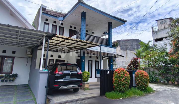 Rumah 2 Lantai LT 167M² di Puspa Indah, Dekat Tol & Mall Rumah 2 Lantai LT 167M² di Puspa Indah, Dekat Tol & Mall