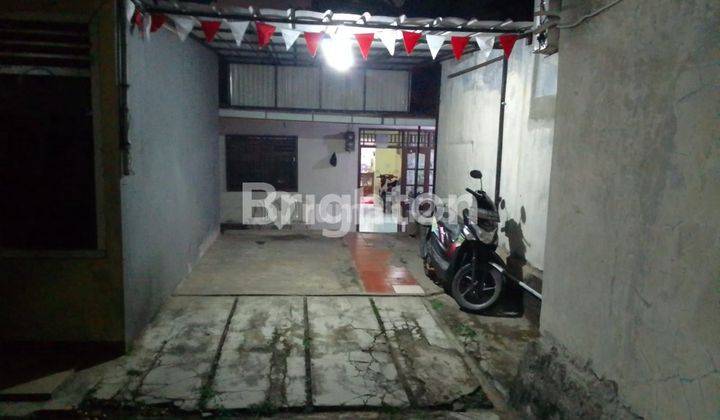 RUMAH DI KUKUSAN TEMPAT STRATEGIS DEKAT DENGAN JALAN RAYA 1