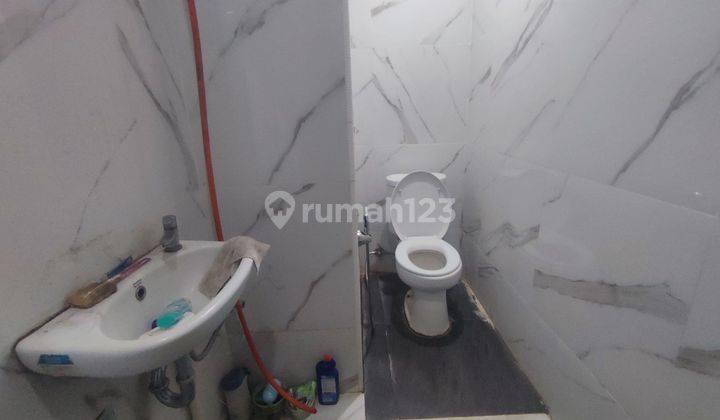 Rumah 10 menit ke Gerbang Tol Cimanggis Hadap Selatan Dibantu KPR J27099 2