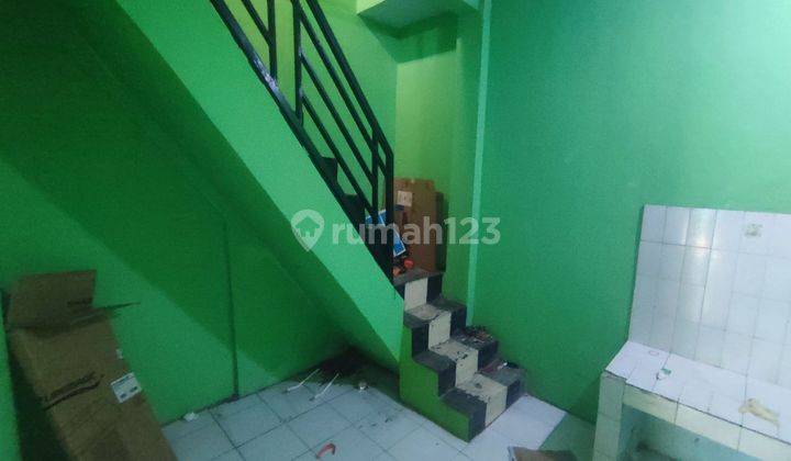 ruang tamu rumah 1 lt dp ringan