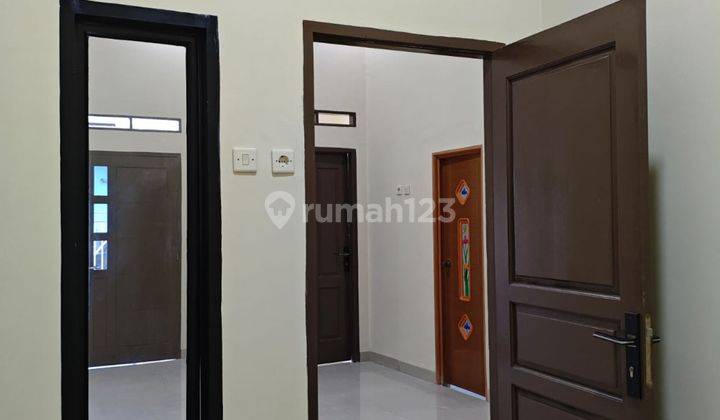 ruang tamu rumah siap huni dibantu kpr