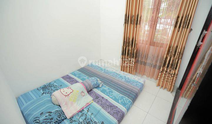 Rumah Seken Minimalis Bebas Banjir di Tapos Depok Siap Kpr 9