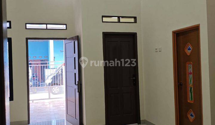 ruang tamu rumah siap huni dibantu kpr