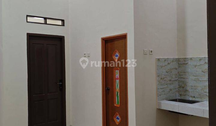 ruang tamu rumah siap huni dibantu kpr