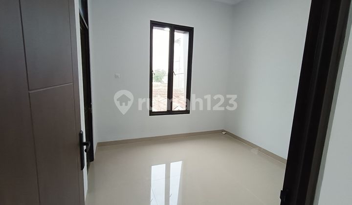 Rumah Strategis 7 Menit ke Terminal Pondok Ungu 2 Lt Hadap Utara J35556 2