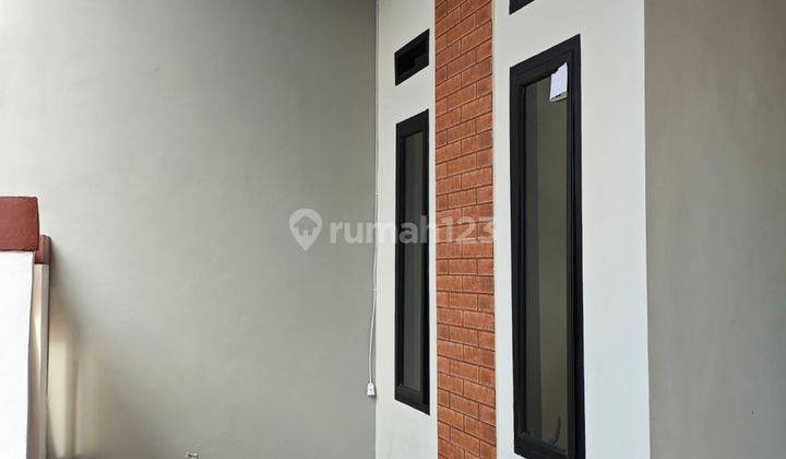 ruang tamu rumah siap huni dibantu kpr