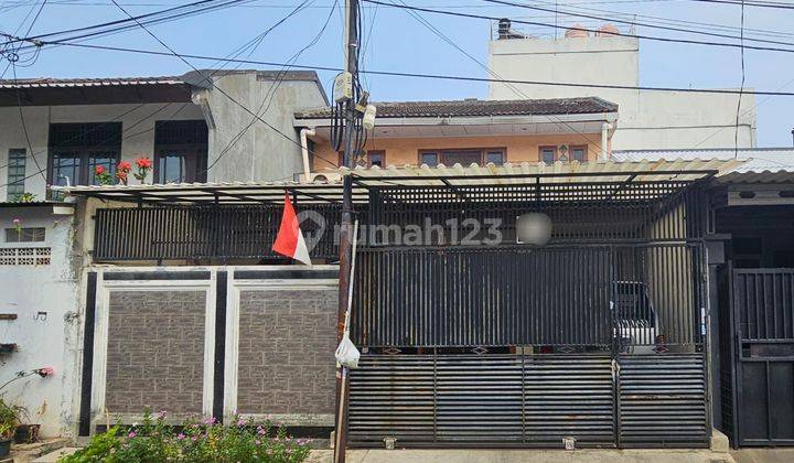 Rumah 10 menit ke Lippo Mall Puri SHM LT 120 Hadap Utara Dibantu KPR J25349