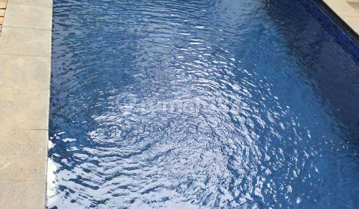 For sale quickly very cheap beautiful villa with swimming pool ready to occupy in Gading Serpong. 2