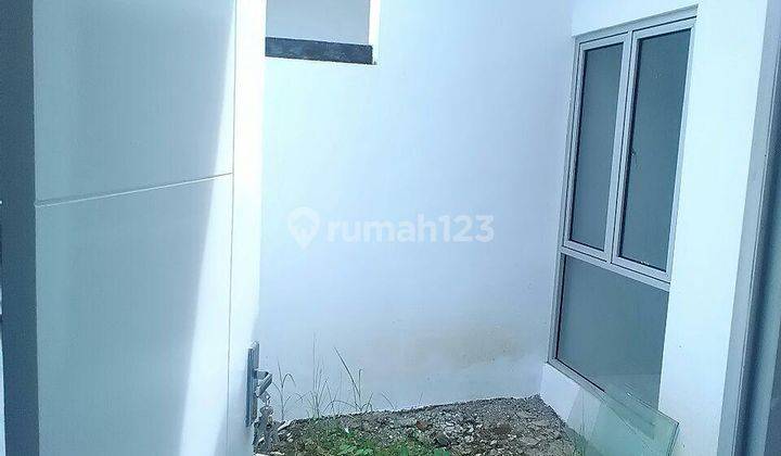 Dijual Rumah Murah di Cluster Mutiara Gading City Harapan Indah 2 Siaphuni Minimalis Modern 2