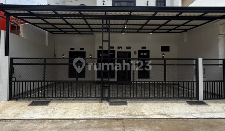 Rumah Model Klasik Modern di Pesona Anggrek Harapan Harapan Jaya Rumah Model Klasik Modern di Pesona Anggrek Harapan Harapan Jaya