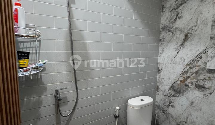 Rumah Ada Kolam Renang di Cluster Lavesh Harapan Indah 13