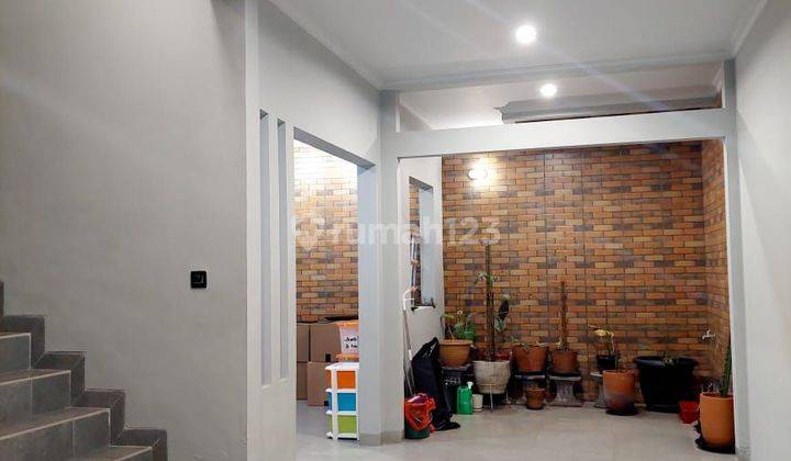 Dijual rumah cluster 3.5 lantai baru renovasi ada rooftop sirkulasi udara bagus di graha raya bintaro  2