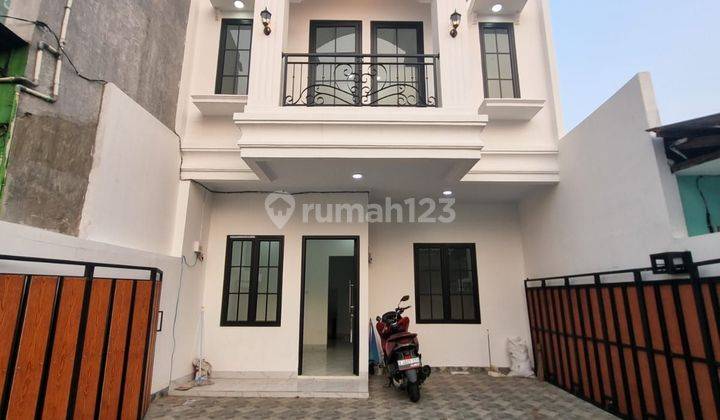 Rumah 2 Lantai Asri Dan Nyaman 1