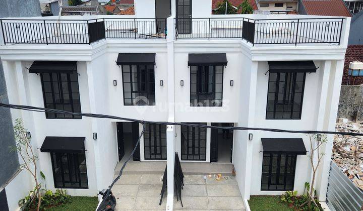 Townhouse Rumah Baru 2 Lantai Rooftop Lokasi Strategis di Rempoa 2