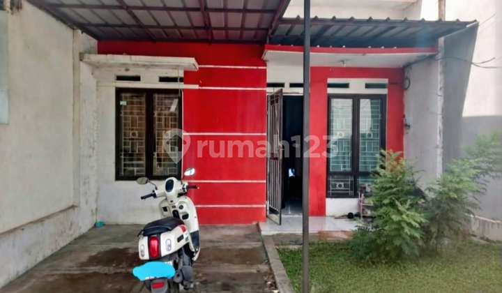 Minimalist 1-Story House in a Cluster Near Graha Raya 2