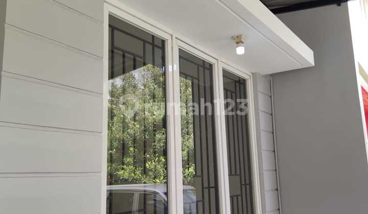 Rumah Minimalis di Cluster Graha Raya SHM 2 Lantai Bagus