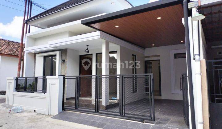 AWAS!! RUMAH BARU MINIMALIS MODERN dalam CLUSTER di UTARA TAJEM  1