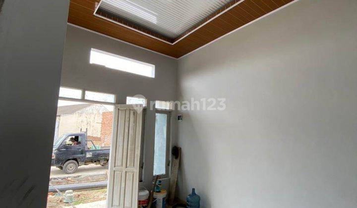 Ruma minimalis, rumah modern di karya jaya ujung 6