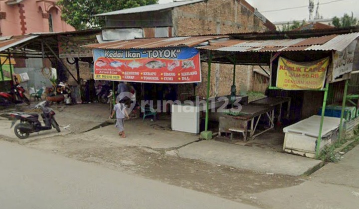 Land by the Side of Medan Johor Main Road