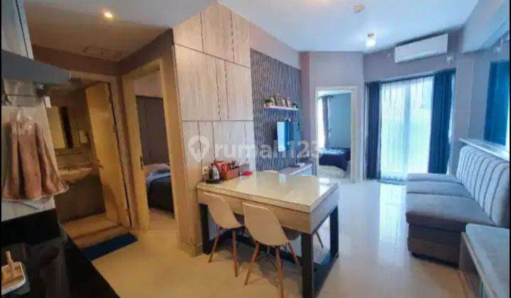 Jual Apartemen Amor Pakuwon City 2 BR Lt 21 Furnished View Laut 1