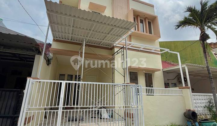 Rumah di Pakuwon City Cluster Griya Asri Sudah Renovasi Strategis Rumah di Pakuwon City Cluster Griya Asri Sudah Renovasi Strategis