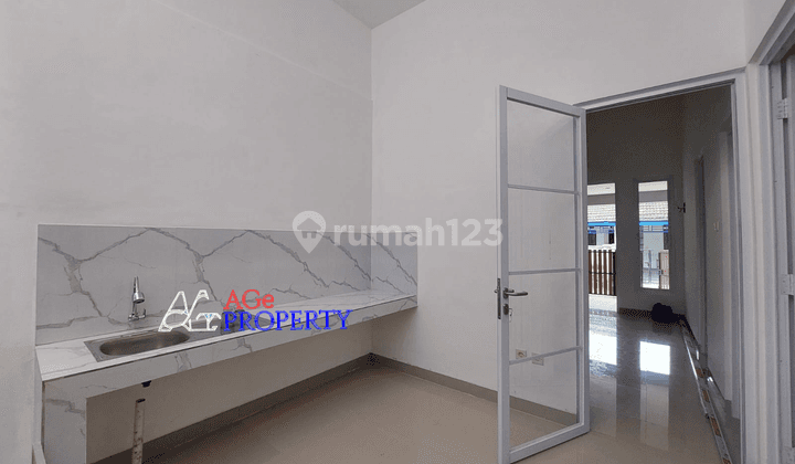 Rumah Dijual Baru  di Renovasi  Perumahan Limus Pratama Regency  11