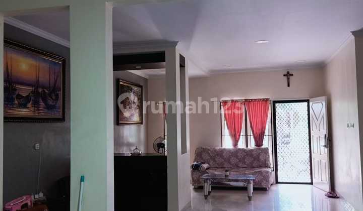For Sale Modern House Strategically Located in Kota Wisata Housing Complex 2