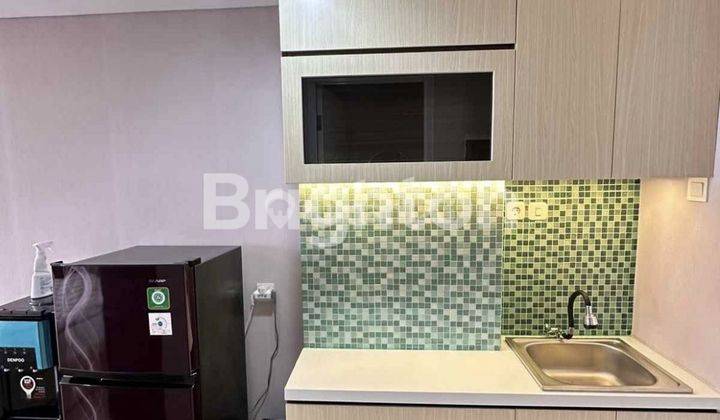 DIJUAL APARTEMEN TAMANSARI SKYLOUNGE TYPE STUDIO FULL FURNISH  2