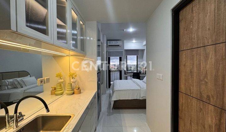 APARTEMEN DELFT FULL FURNISH SIAP HUNI CITRALAND CPI MAKASSAR 1