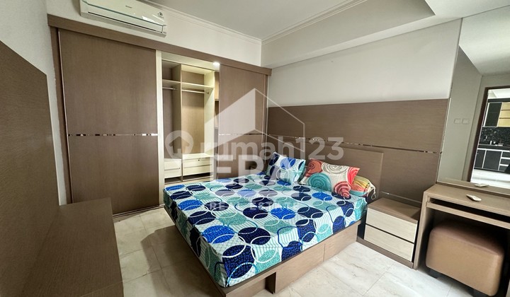 sewa 2 kamar furnish lantai sedang apartemen royal mediterania garden 1
