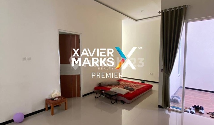 For Sale Minimalist 3-Storey House in Good Condition, Clean and Tidy with Laundry Area and Drying Space, Move-In Ready. Safe and Comfortable Environment, Strategic Location Near Jl Soekarno Hatta and Muhammadiyah University in Tegalgondo, Singosari, Malang. G992