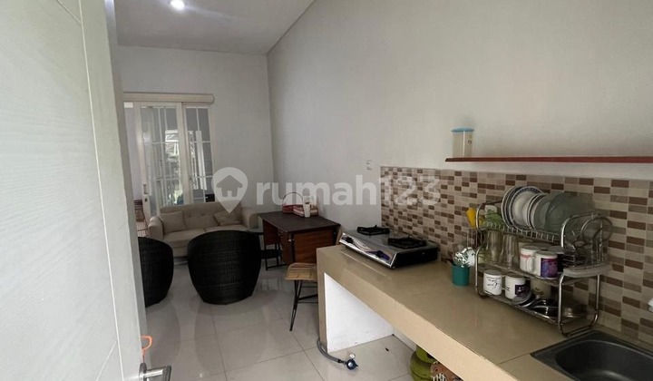 For Sale Minimalist 2-Story House, Well-Maintained and Clean, Includes Parking and Drying Area, Ready to Occupy, Beautiful and Comfortable Neighborhood, Close to City Center and Prestigious University, Easy Access to Health Center at Green Orchid Cluster Aranthera 2, Lowokwaru, Malang City H562 2