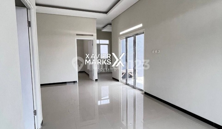 For Sale Beautiful Minimalist 2-Storey House, Renovated, Good Clean Condition, Has Drying Area and Semi-Furnished, Ready to Occupy, Environment with One Gate System, Location Near City Center and Near UMM Unisma Campus in Tunggulwulung, Soekarno Hatta, Malang City H585 2