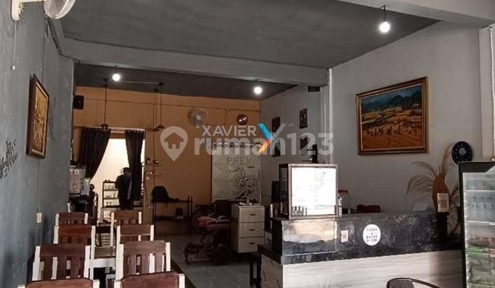 For Sale: Minimalist 2-Story Shophouse in Well-Maintained Condition, Already Adapted for Residential and Business Use. Located on a Main Road, Ideal for Business. Strategic Location Near the City Center with Easy Access to All Areas in Mutiara Jingga Residence, Tasikmadu, Malang City H502. 2