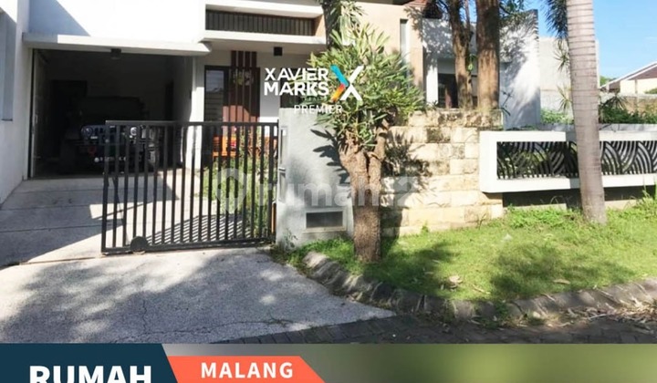 Dijual Rumah Minimalis dan Kondisi Terawat Ada Gazebo Siap Huni Lingkungan Aman One Gate System di Kawasan Elit Tengah Kota Akses Mudah ke Exit Tol Singosari dan Dekat ke Wisata Hawaii Waterpark di Boulevard Perumahan Graha Kencana Malang Kota H124